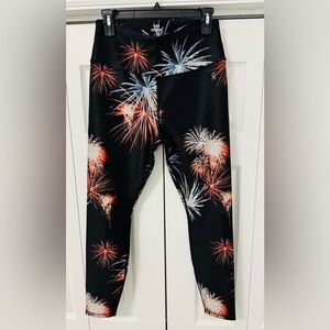 Black leggings with red, white, and blue fireworks